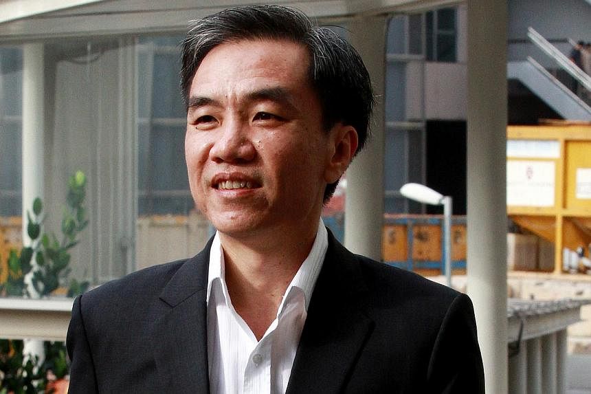 Former City Harvest Church board member John Lam Leng Hung, 46, had raised doubts about projected American album sales of church founder Kong Hee's wife Ho Yeow Sun, he testified on Tuesday. -- ST PHOTO: LAU FOOK KONG