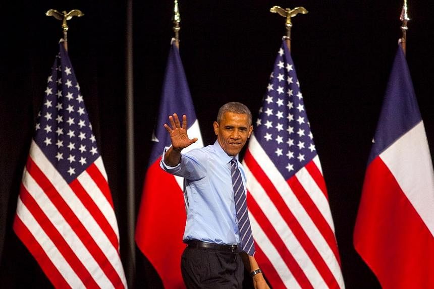 US President Barack Obama walks out to deliver a speech at the Paramount Theatre on July 10, 2014 in Austin, Texas. In a phone call to his Chinese counterpart on July 14, 2014, Mr Obama&nbsp;said he wanted US-Chinese relations defined by more coopera