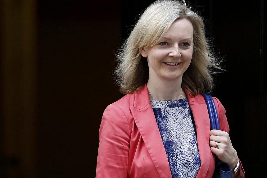Britain's new Secretary of State for Environment Food and Rural Affairs Liz Truss leaves 10 Downing Street after her appointment in central London,on July 15, 2015.&nbsp;-- PHOTO: REUTERS