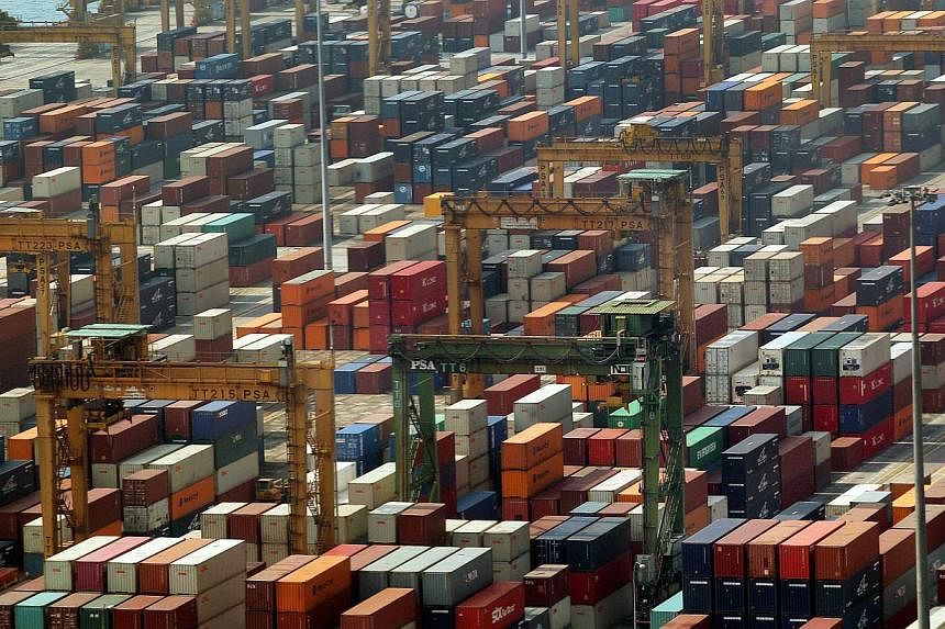 Singapore's non-oil domestic exports are expected to fall on an annual basis in June for the second straight month, a Reuters poll showed on Tuesday, adding to signs of a slowdown in the city-state's manufacturing activity. -- ST PHOTO: LAU FOOK KONG