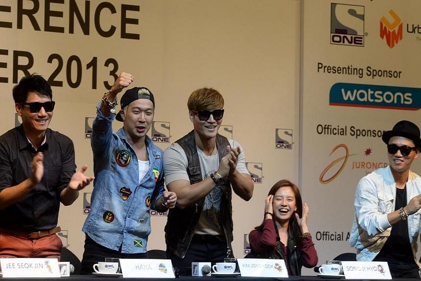 South Korean variety game show Running Man cast regulars (from left) Jee Seok Jin, Haha, Kim Jong Kook, Song Ji Hyo and Gary at a press conference held on Oct 18, 2013. -- PHOTO: ST FILE