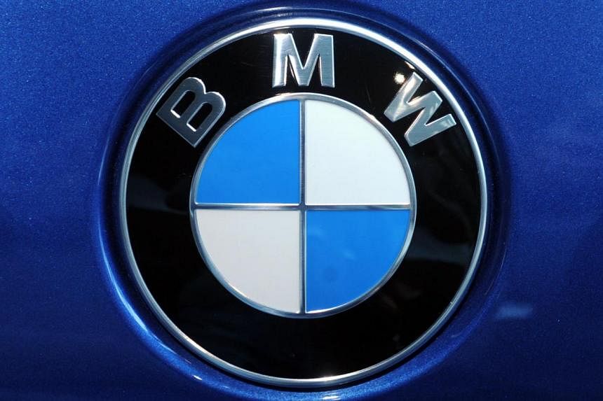 A picture taken on March 13, 2012, shows the logo of BMW on a car exhibited during the company's annual results press conference in Munich, southern Germany. The German top-of-the-range car maker said on July 16, 2014 it will recall around 1.6 millio