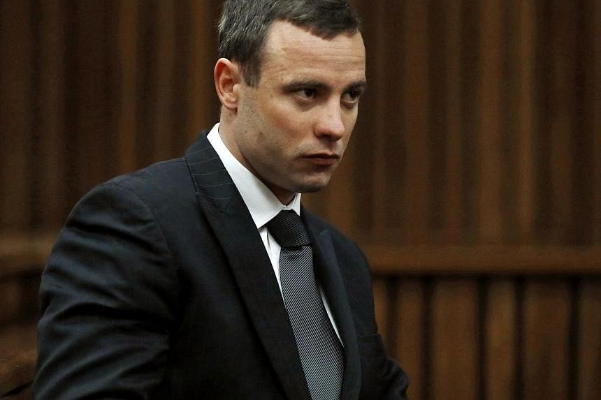A file picture taken on July 1, 2014, shows South African Olympic and Paralympic sprinter Oscar Pistorius sitting in the dock during his murder trial in the North Gauteng High Court in Pretoria.&nbsp;Paralympian star Oscar Pistorius' visit to a night
