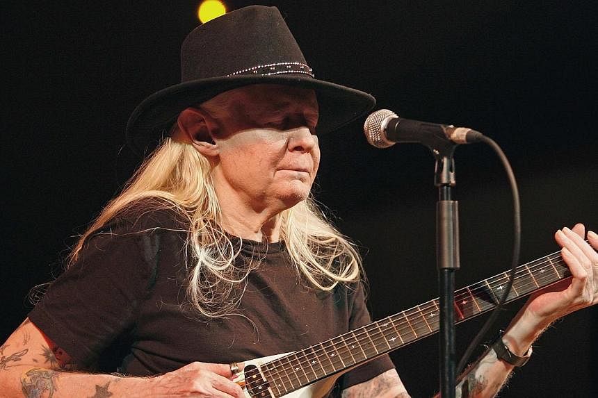 Legendary blues guitarist Johnny Winter performs on stage during a concert at the Valencia Jazz Festival on July 19, 2008.&nbsp;Johnny Winter, an American blues rock guitarist, vocalist and band leader best known for his virtuoso slide-guitar solos a