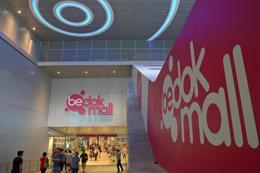 The facade of Bedok Mall. Shopping mall owner CapitaMalls Asia (CMA) will be delisted from the Singapore Exchange mainboard on July 22, its parent CapitaLand said in a statement on Thursday, July 17, 2014. -- PHOTO: ST FILE