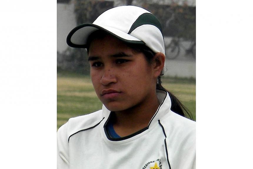 This photograph taken on February 17, 2012 shows female Pakistani cricketer Halima Rafique posing for a photograph at a local cricket stadium in Multan.&nbsp;A female Pakistani cricketer who committed suicide by drinking acid was under extreme stress