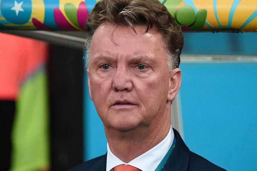 Louis van Gaal started a new era at Manchester United on Wednesday, July 16, 2014, as the Dutch manager arrived for his first day in charge of the fallen giants. -- PHOTO: AFP
