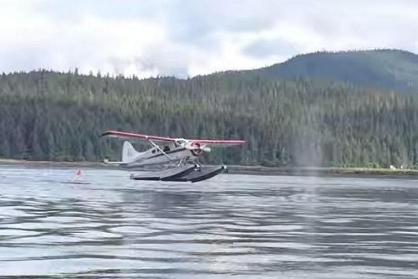 A dramatic video of a sea plane just missing a surfacing humpback whale as it came in to land in Alaska has become a hit online. -- PHOTO: SCREENGRAB FROM YOUTUBE