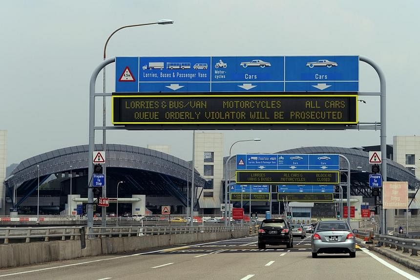 The Ministry of Transport has expressed concern that Malaysia has targeted Singaporean motorists by planning to charge vehicles entering the state of Johor. -- ST PHOTO:&nbsp;CAROLINE CHIA