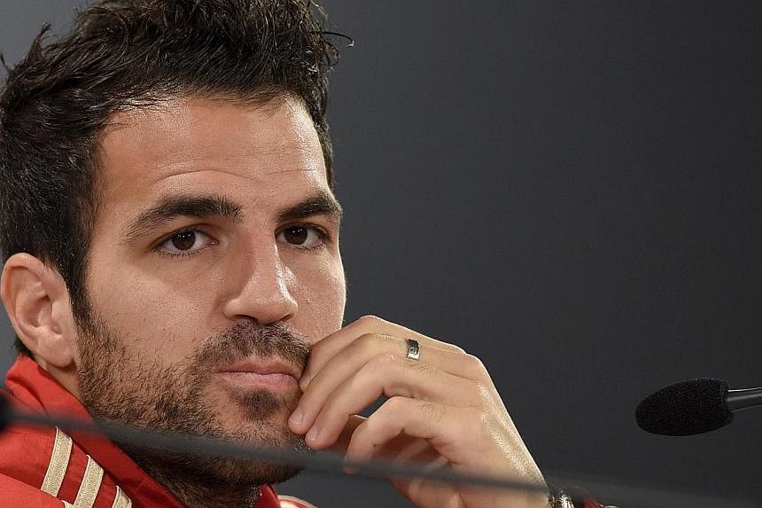 Spain's midfielder Cesc Fabregas attends a press conference on June 15, 2014, at CT do Caju in Curitiba during the 2014 FIFA Football World Cup in Brazil. -- PHOTO: AFP