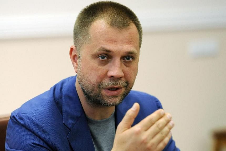 Self-proclaimed Prime Minister of the pro-Russian separatist "Donetsk People's Republic" Alexander Borodai holds a press-conference in the eastern Ukrainian city of Donetsk, on July 18, 2014. -- PHOTO: AFP