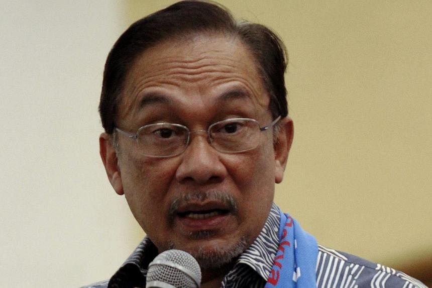 Opposition Leader Anwar Ibrahim has declared his full support for Prime Minister Najib Razak's call for an emergency parliamentary sitting over the MH17 tragedy. -- PHOTO: THE STAR/ASIA NEWS NETWORK