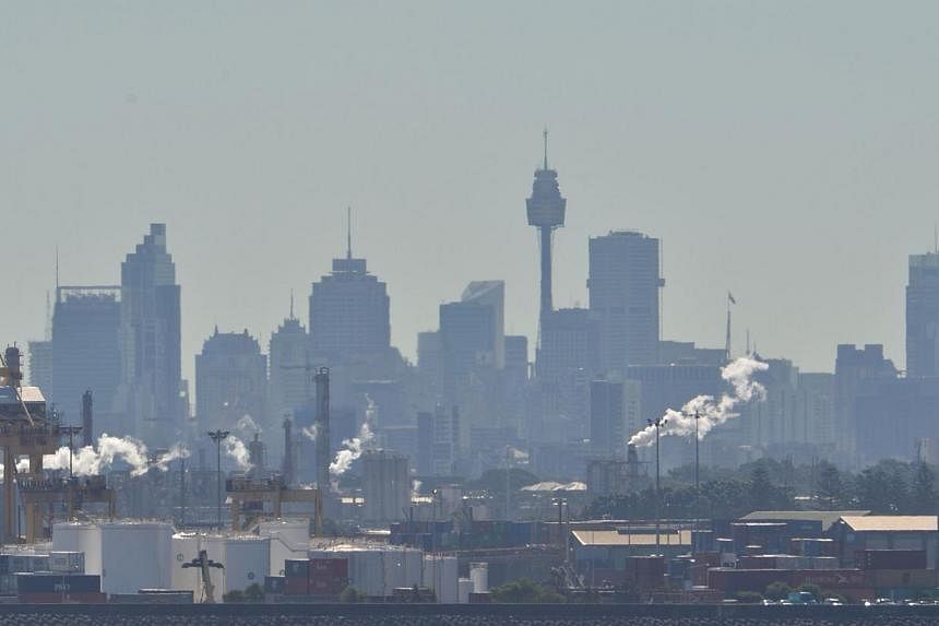 Photo taken on June 3, 2014 shows a view of industry belching emmissions across Botany Bay in Sydney. -- PHOTO: REUTERS