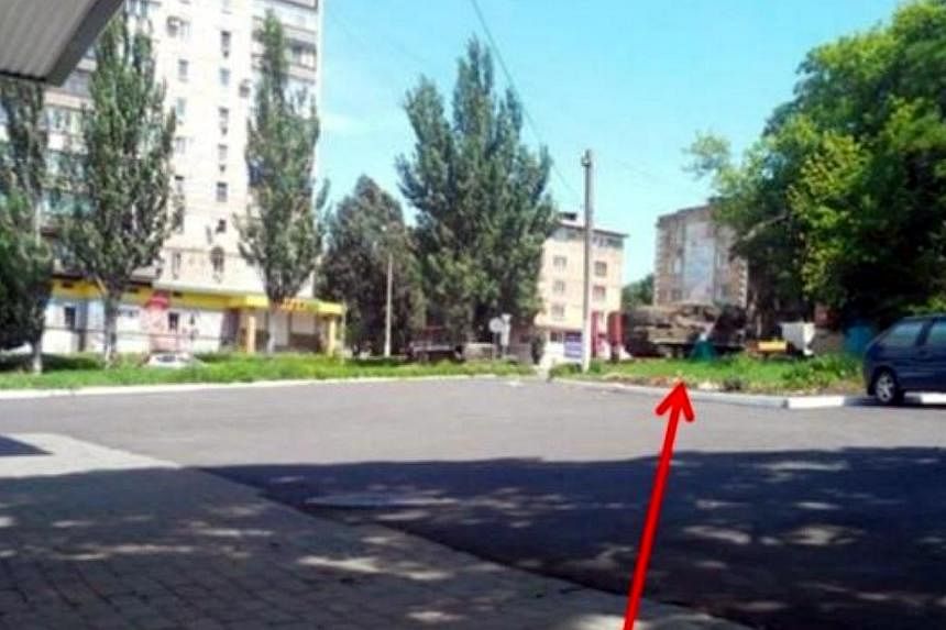 Photo evidence of one of the Russian BUK-M1 surface-to-air missile systems near the town of Snizhne provided by the Ukraine crisis media centre. -- PHOTO: THE STAR/ASIA NEWS NETWORK