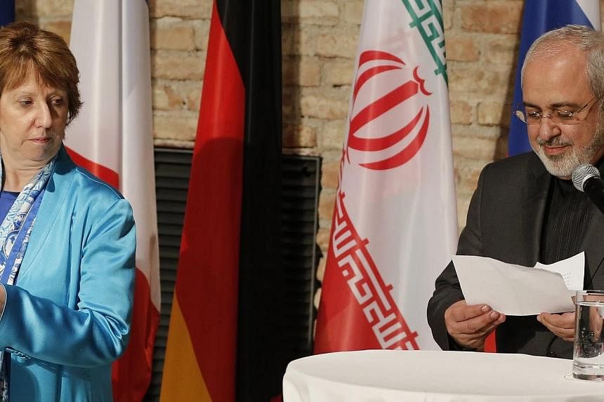 &nbsp;EU foreign policy chief Catherine Ashton and Iranian Foreign Minister Mohammad Javad Zarif attend a news conference in Vienna on July 18, 2014.&nbsp;Iran faced Western pressure on Saturday to make concessions over its atomic activities after it
