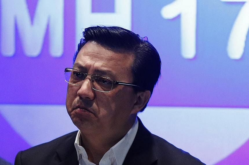 Malaysia Transport Minister Liow Tiong Lai arrived in Kiev on Sunday, July 20, 2014, with a six-member delegation assist the Malaysian team in a special operation on the MAS flight MH17 crash in east Ukraine on Thursday, July 17, 2014. -- PHOTO: REUT
