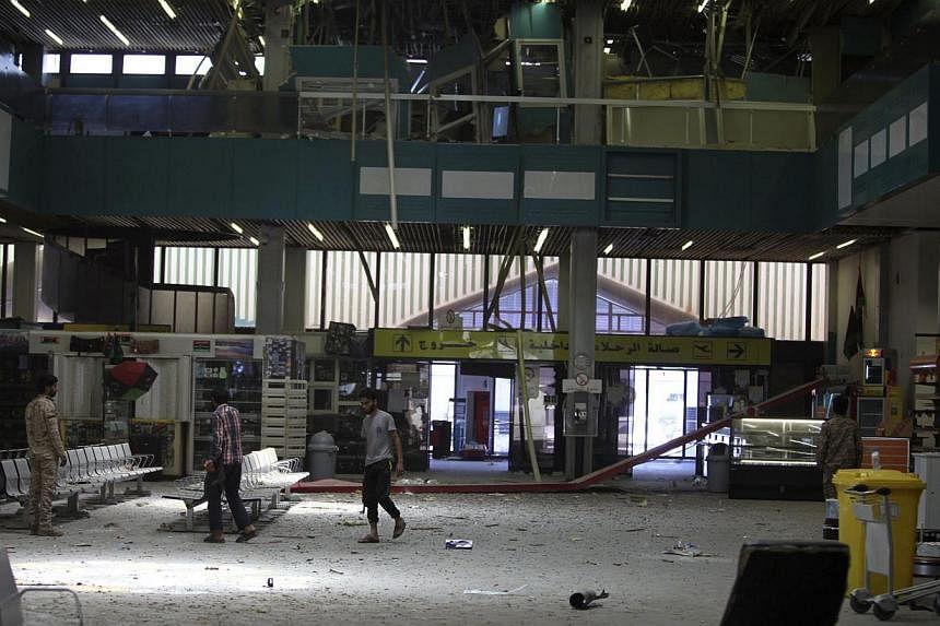 The inside of a damaged terminal is seen after a shelling at Tripoli International Airport on July 17, 2014.&nbsp;Heavy fighting has erupted around Tripoli International Airport, where rival militias have been battling for a week for control of the s