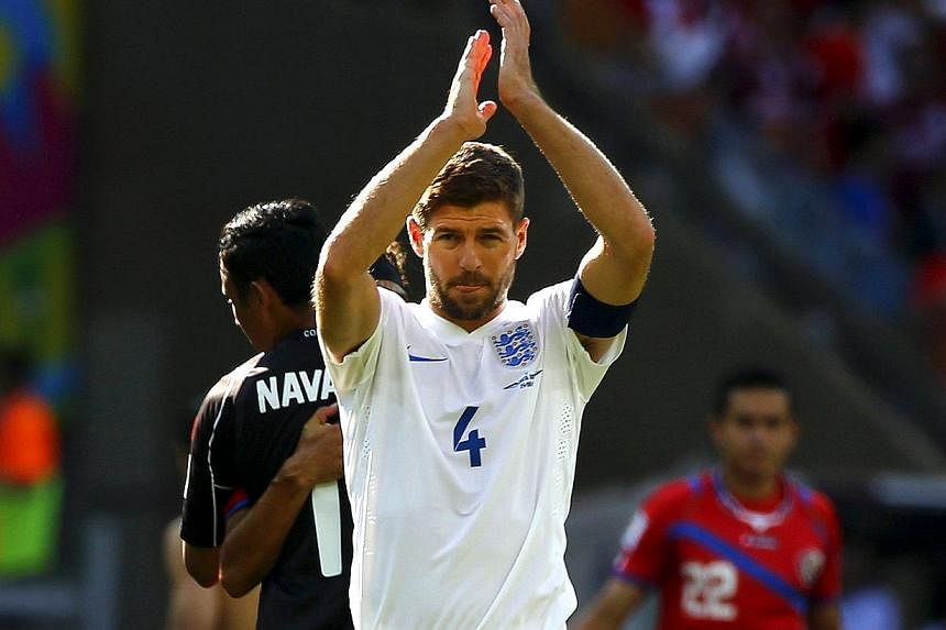 England Football: Steven Gerrard announces retirement from international  football