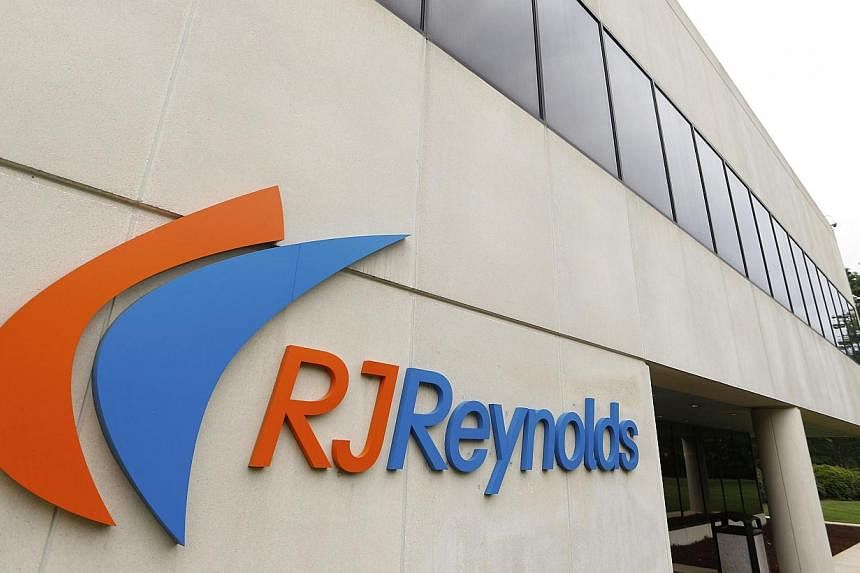 An R.J. Reynolds sign is seen outside the 1-million-square-foot cigarette manufacturing facility in Tobaccoville, North Carolina on May 23, 2014. -- PHOTO: REUTERS