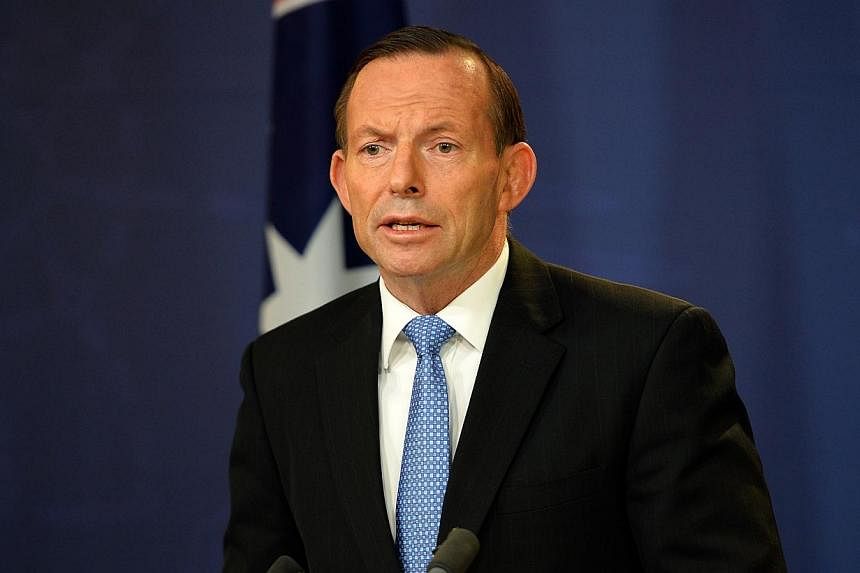 Australian Prime Minister Tony Abbott speaks at a press conference in Sydney on July 19, 2014.&nbsp;Evidence at the crash site of Malaysia Airlines MH17 has been tampered with on an industrial scale as part of an apparent cover-up attempt, Mr Abbott 