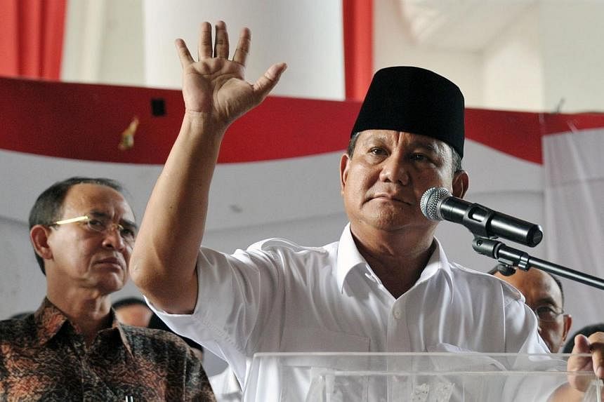Indonesian presidential candidate Prabowo Subianto delivers his statement prior to the election count announcement in Jakarta on July 22, 2014. -- PHOTO: AFP