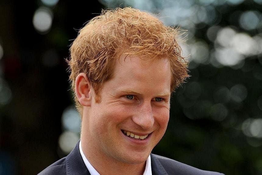 Britain's Prince Harry has spoken of his hatred for the micro-blogging website Twitter due to its role in the invasion of his privacy, newspapers reported on July 22, 2014. -- PHOTO: AFP&nbsp;