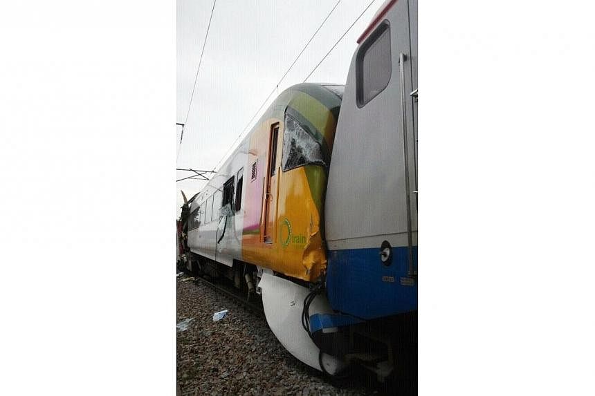 Two passenger trains collided in Taebaek, 200km south-east of Seoul, on Tuesday, killing one person and injuring dozens, a hospital official and police said, in the latest in a string of accidents that has rattled the country. -- PHOTO:&nbsp;THE KORE