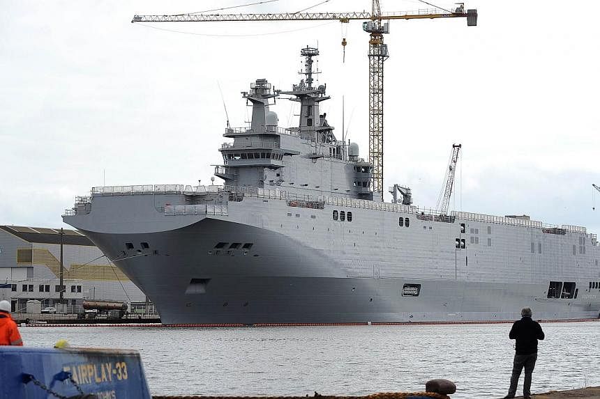 A photo taken on May 9, 2014 in Saint-Nazaire, western France, shows the Mistral-class LHD amphibious vessel Vladivostok, which was ordered by Russia.&nbsp;French officials defended President Francois Hollande's decision to push ahead with delivery o