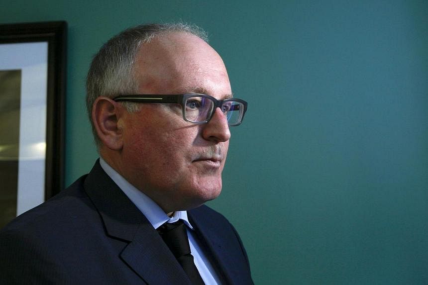 Netherlands' Foreign Minister Frans Timmermans speaks with members of the media after a news conference in New York, on July 21, 2014. -- PHOTO: REUTERS