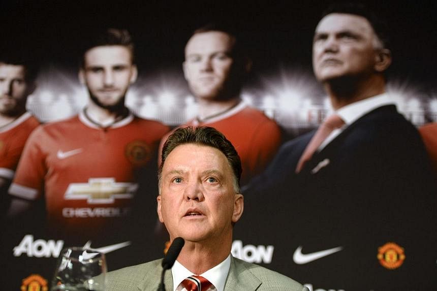 New Manchester United manager Louis Van Gaal speaks to the media during a news conference at the club's Old Trafford Stadium in Manchester, northern England, on July 17, 2014. -- PHOTO: REUTERS