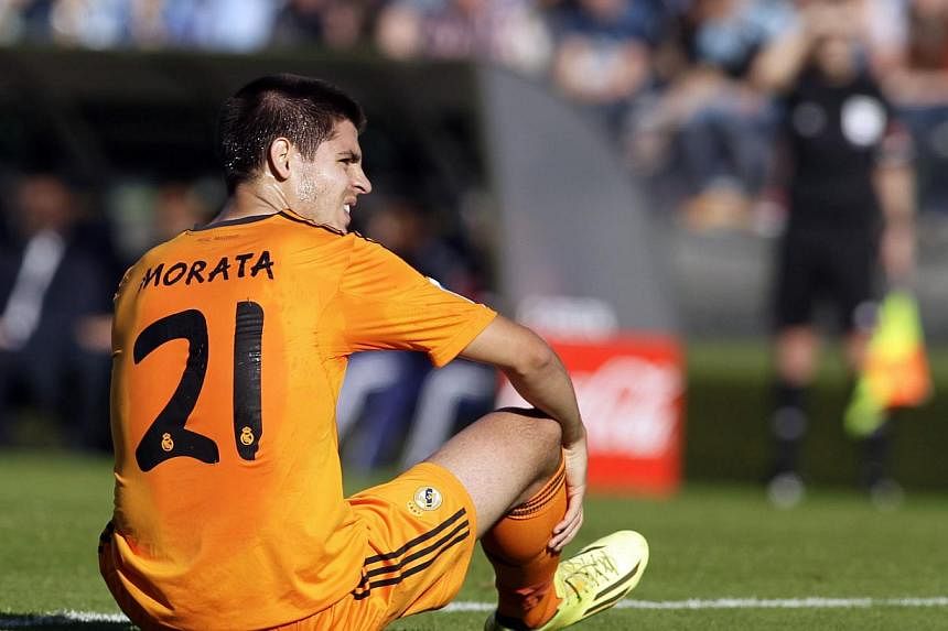Real Madrid's Alvaro Morata reacts during their Spanish first division match against Celta Vigo at the Balaidos stadium in Vigo on May 11, 2014.&nbsp;-- PHOTO: REUTERS