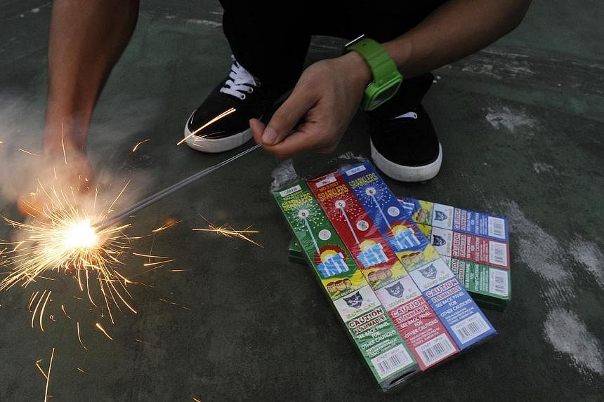 Ahead of the festive season, the police have reminded the public that they take a serious view of setting off improvised explosive devices made with sparklers. -- PHOTO: ST FILE&nbsp;
