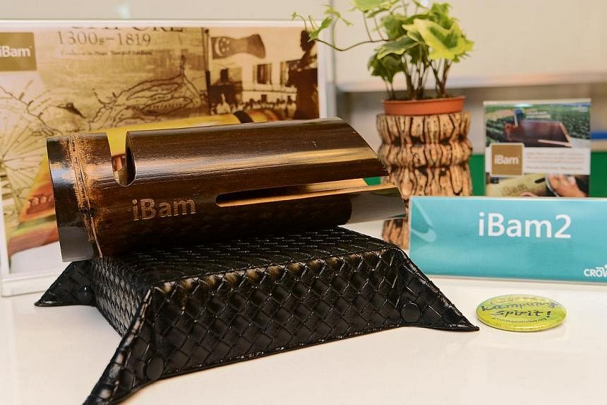 The iBam is set to be the world's first compact electricity-free bamboo speaker for any mobile phone. -- ST PHOTO: MATTHIAS HO