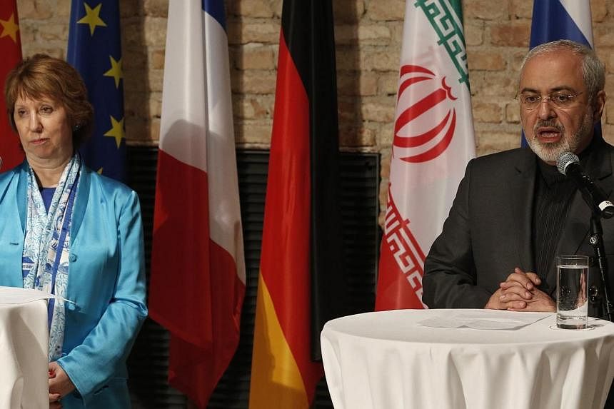 EU foreign policy chief Catherine Ashton (left) and Iranian Foreign Minister Mohammad Javad Zarif attend a news conference during the previous round of negotiations in Vienna on July 18, 2014.&nbsp;Iran said on Wednesday, July 23, 2014, that nuclear 