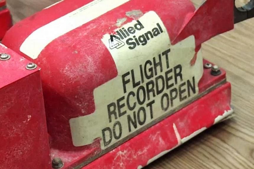 The black boxes from the Malaysia Airlines flight MH17 that crashed in eastern Ukraine, killing all on board, have been delivered to Britain for expert analysis, the government said Wednesday, July 23, 2014. -- PHOTO: AFP