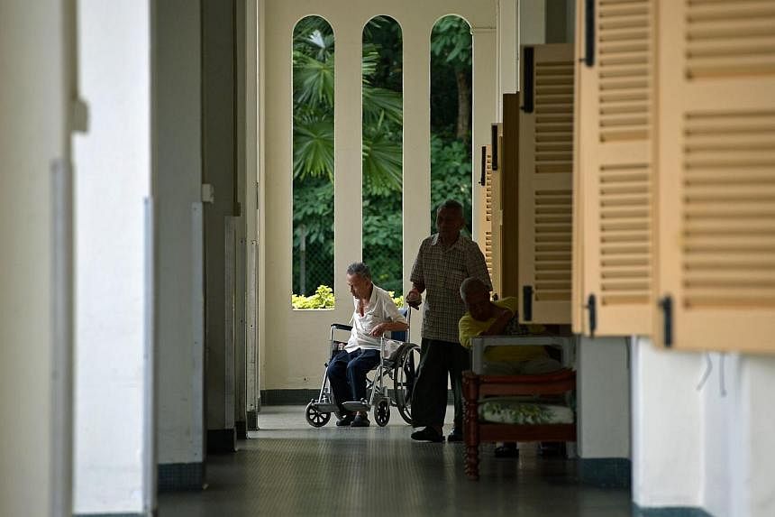 Elderly residents at a nursing home. The National Trades Union Congress announced on Wednesday plans to build its first nursing home next year, to address the healthcare needs of the elderly. -- PHOTO: ST FILE