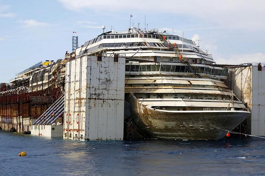 The Costa Concordia cruise liner is seen during its refloat operation at Giglio harbour on July 22, 2014. -- PHOTO: REUTERS