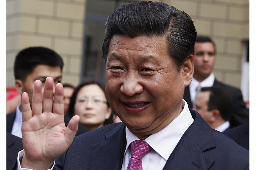 Chinese President Xi Jinping met his Cuban counterpart Raul Castro Tuesday in a visit to expand investment in the fellow communist nation, his last stop on a four-country Latin American charm offensive. -- PHOTO: REUTERS