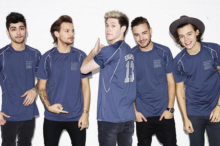 English-Irish boy band One Direction comprising (from left) Zayn Malik, Louis Tomlinson, Niall Horan, Liam Payne and Harry Styles. -- PHOTO: LIVE NATION LUSHINGTON