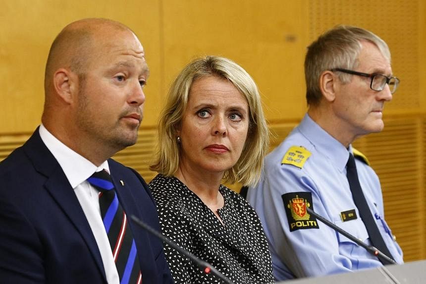 (From left) Mr Anders Anundsen, Norway's minister of justice and public security, Ms Benedicte Bjoernland, head of the Police Security Service, PST, and Mr Vidar Refvik, head of the police force, hold a news conference in Oslo on July 24, 2014. -- PH
