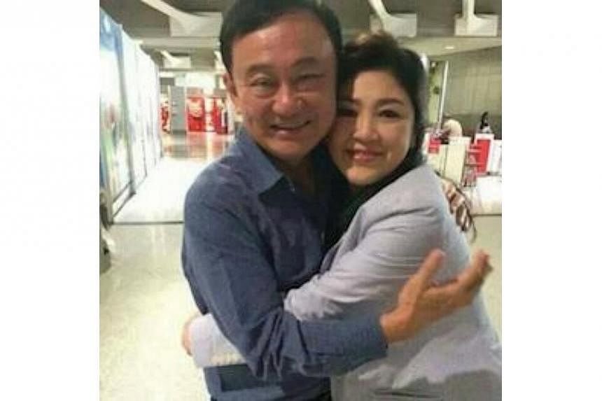 Former Thai prime minister Yingluck Shinawatra on Thursday reunited with her brother Thaksin Shinawatra, in Paris, Thai media reported. -- PHOTO:&nbsp;I'NAM MATICHON/TWITTER&nbsp;