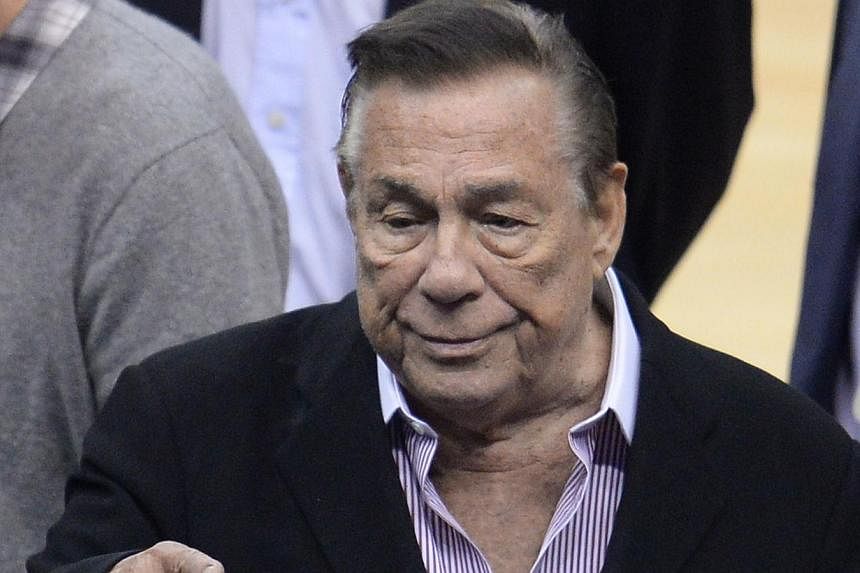 This April 21, 2014 file photo shows Los Angeles Clippers owner Donald Sterling attending the NBA playoff game between the Clippers and the Golden State Warriors at Staples Center in Los Angeles, California. -- PHOTO: AFP