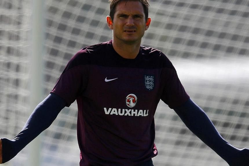 England's Frank Lampard arrives for a training session for the 2014 World Cup in Rio de Janeiro June 16, 2014. Chelsea's all-time top scorer and England midfielder Frank Lampard has signed to play for Major League Soccer 2015 expansion side New York 