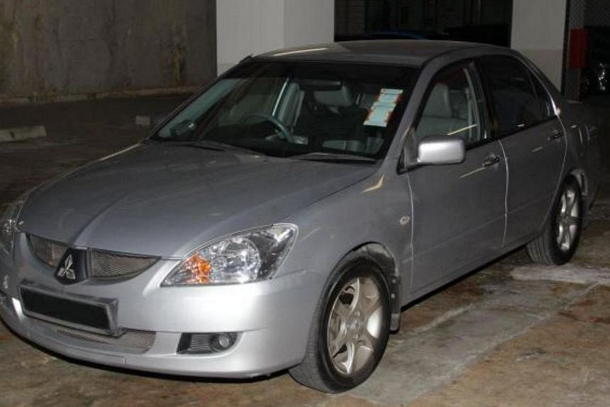A car that was seized in a CNB operation on Thursday, July 24, 2014. -- PHOTO: CENTRAL NARCOTICS BUREAU
