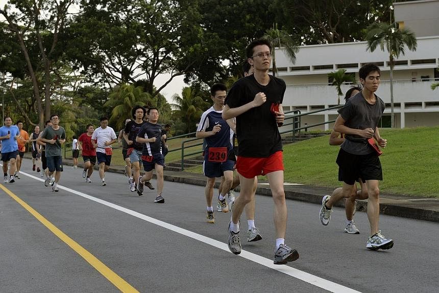 The HomeTeamNS announced on Friday, July 25, 2014, that it will be piloting a new fitness training programme to help its NSmen pass the Individual Physical Proficiency Test (IPPT). -- ST PHOTO:&nbsp;DESMOND FOO