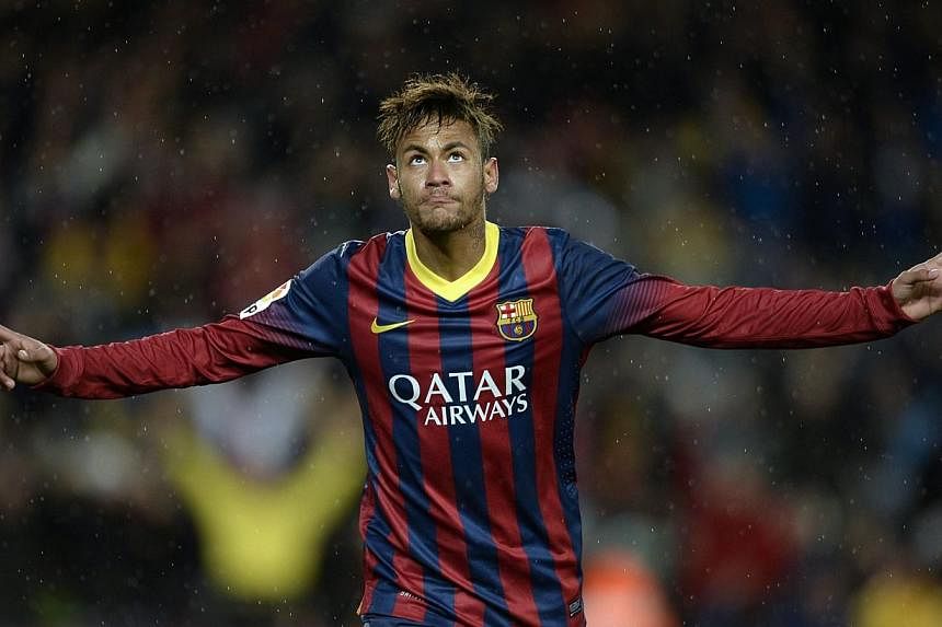 Brazilian superstar Neymar's brain activity while dancing past opponents is less than 10 per cent the level of amateur players, suggesting he plays as if on auto-pilot, according to Japanese neurologists. -- PHOTO: AFP