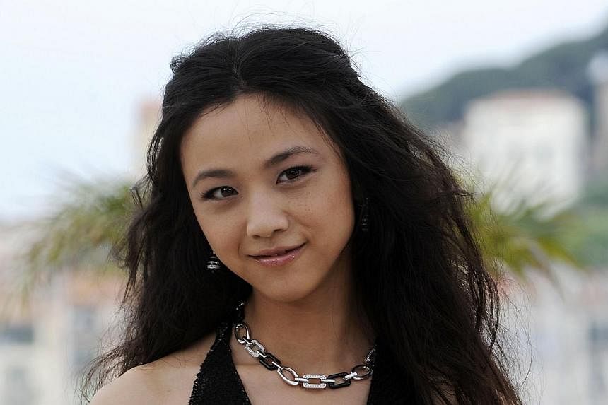 Chinese actress Tang Wei during a photocall for Wu Xia at the 64th Cannes Film Festival in Cannes on May 14, 2011. Tang Wei and South Korean director Kim Tae Yong have held an impromptu wedding in Sweden, ahead of an official ceremony next month. -- 