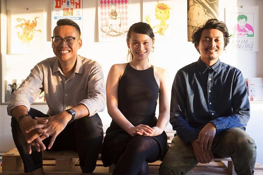The team from risograph press Knuckles And Notch (from left) Mr Muhammad Izdi, Ms Marilyn Yunjin and Mr Djohan Hanapi. -- PHOTO: LOUIS KWOK