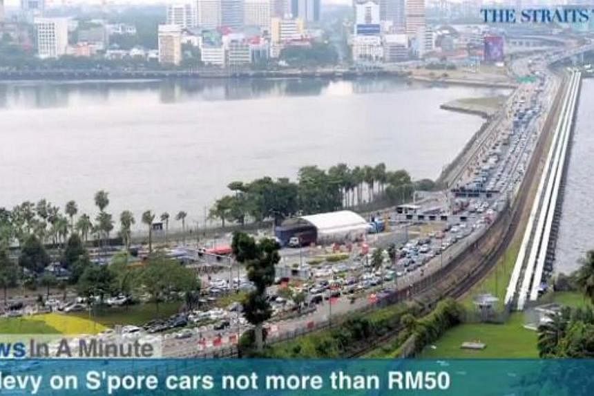 In today's The Straits Times News In A Minute video, we look at how the levy for Singapore cars entering Johor will not be more than RM50 (S$20), according to a Malaysian minister. -- PHOTO: SCREENGRAB FROM VIDEO