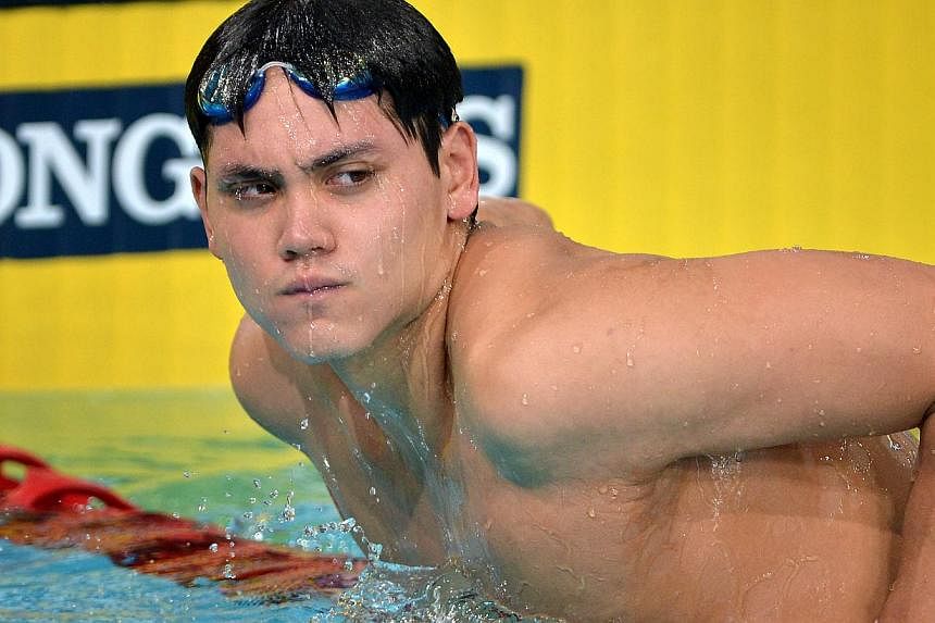 Joseph Schooling off the blcks at the semi-finals of the 50m butterfly event held at the Tollcross Swimming Centre. -- ST PHOTO:&nbsp;KUA CHEE SIONG